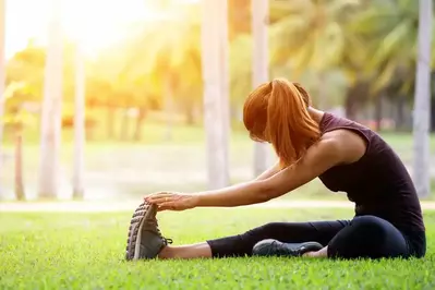 woman stretching outside